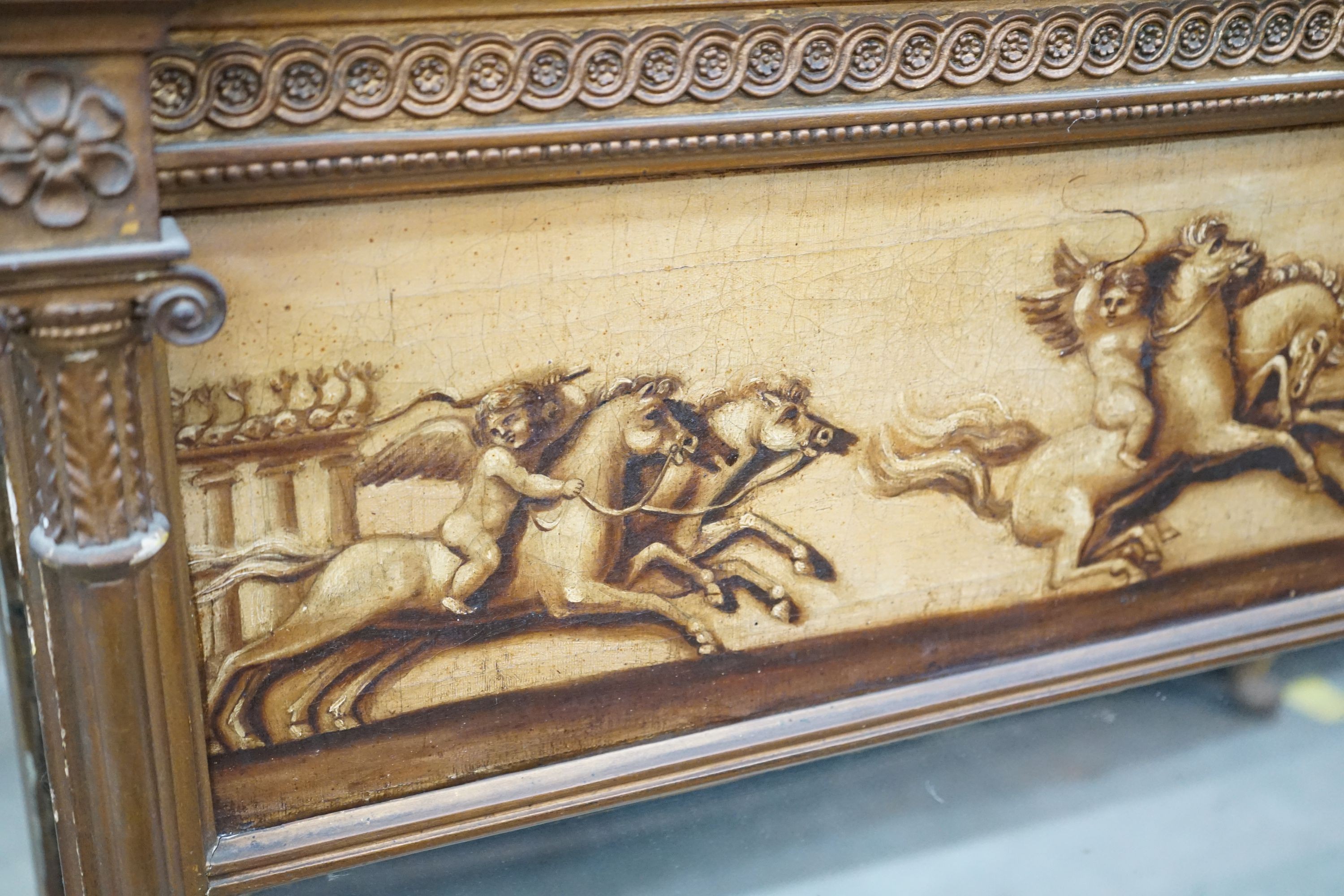 A 19th century and later gilt framed overmantel mirror with oil on canvas frieze decorated with putti, width 142cm, height 96cm